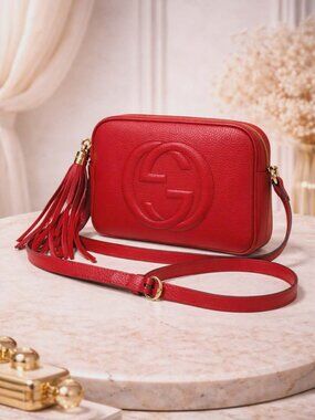 Authentic Gucci Soho Disco Red Leather Crossbody Bag GG Logo Tassel Small Camera